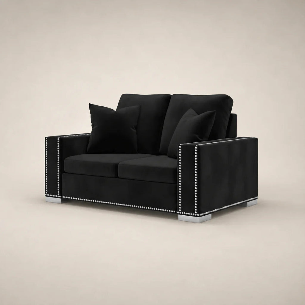 Black velvet two-seater sofa with silver nailhead trim and chrome feet, luxury living room furniture