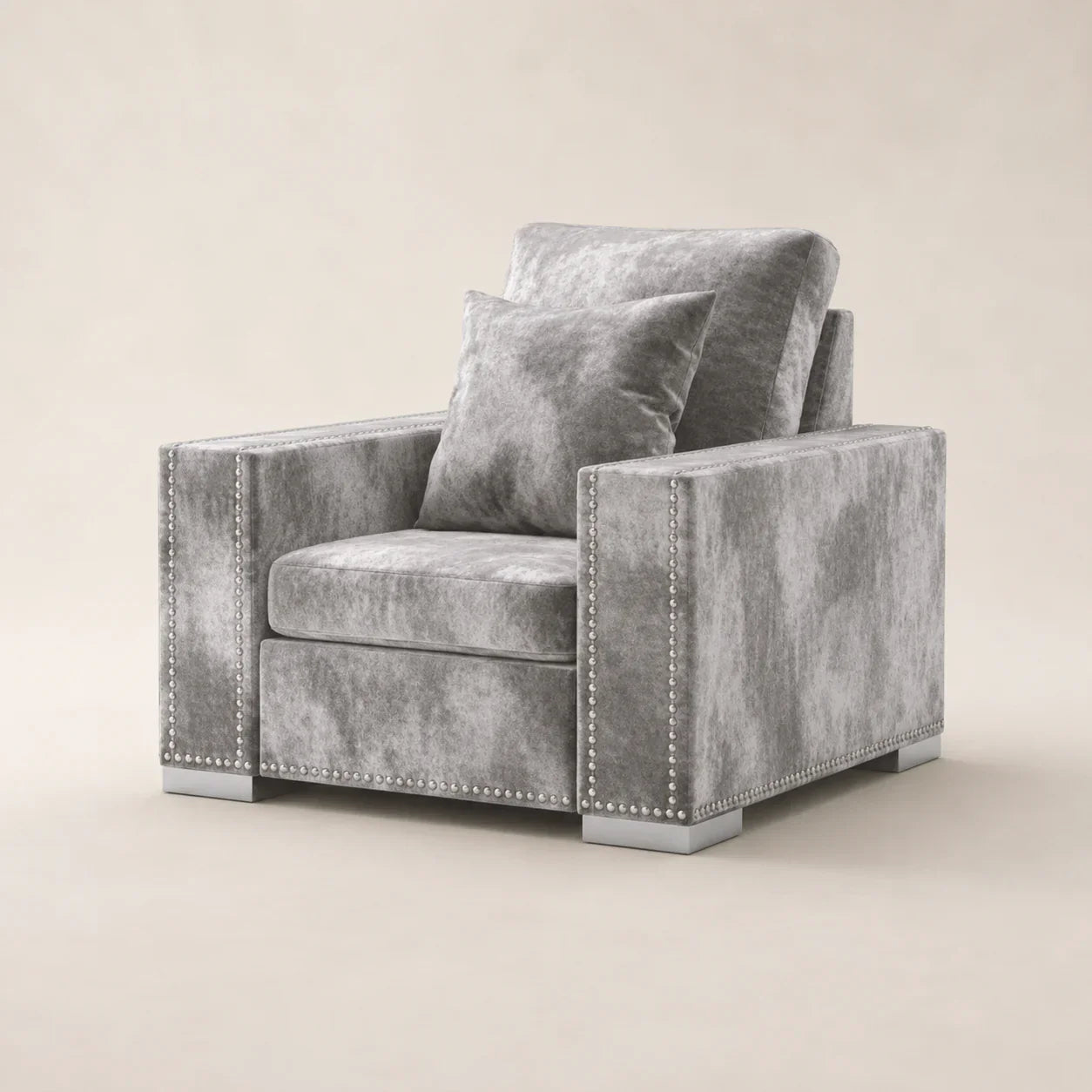 Luxury gray velvet armchair with nailhead trim and matching pillow, modern living room furniture