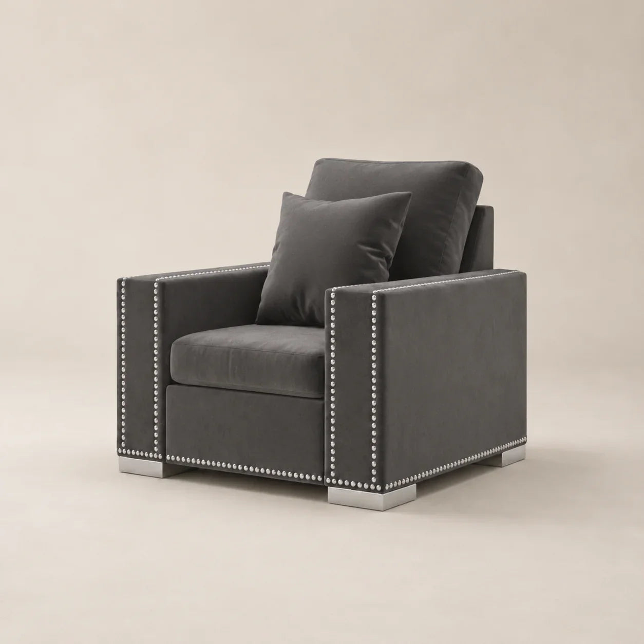 Grey velvet armchair with silver nailhead trim and matching cushions, modern luxury living room furniture