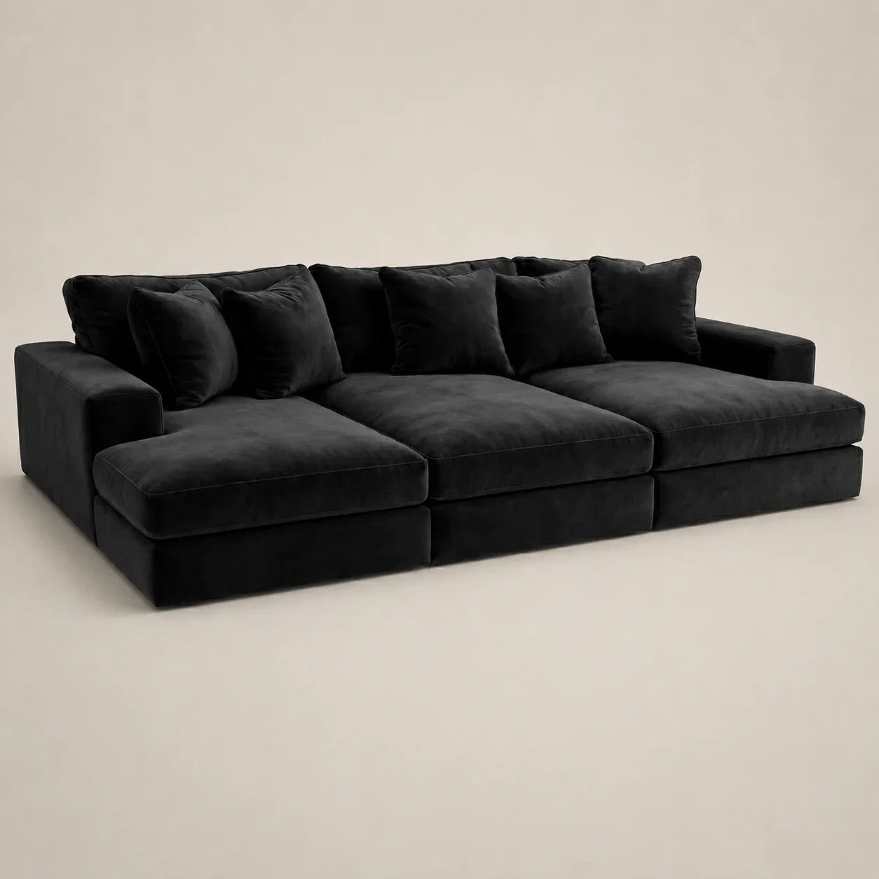 Luxury black velvet sectional sofa with plush cushions, ideal for modern living rooms