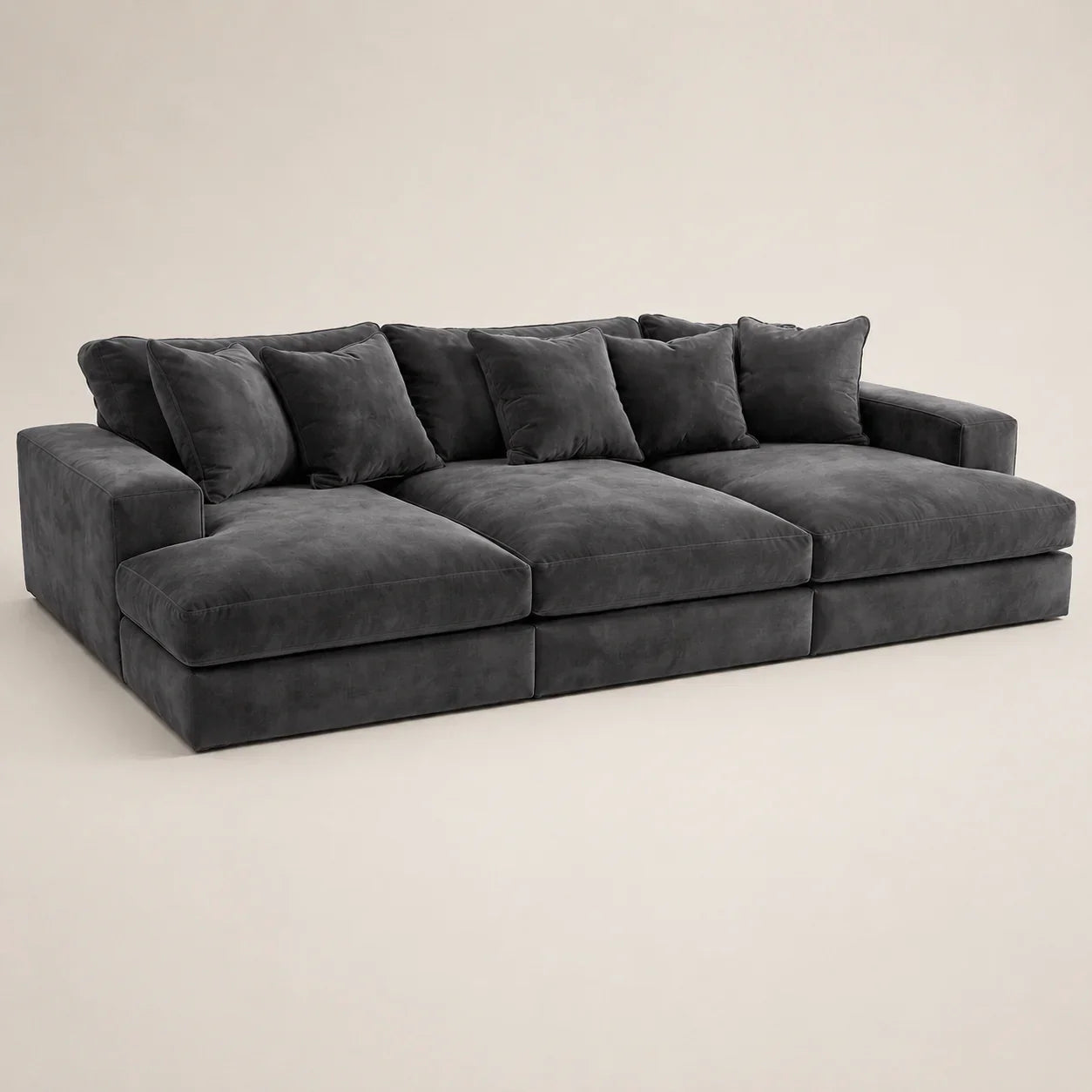 Luxury dark grey velvet sectional sofa with plush cushions, ideal for modern living rooms