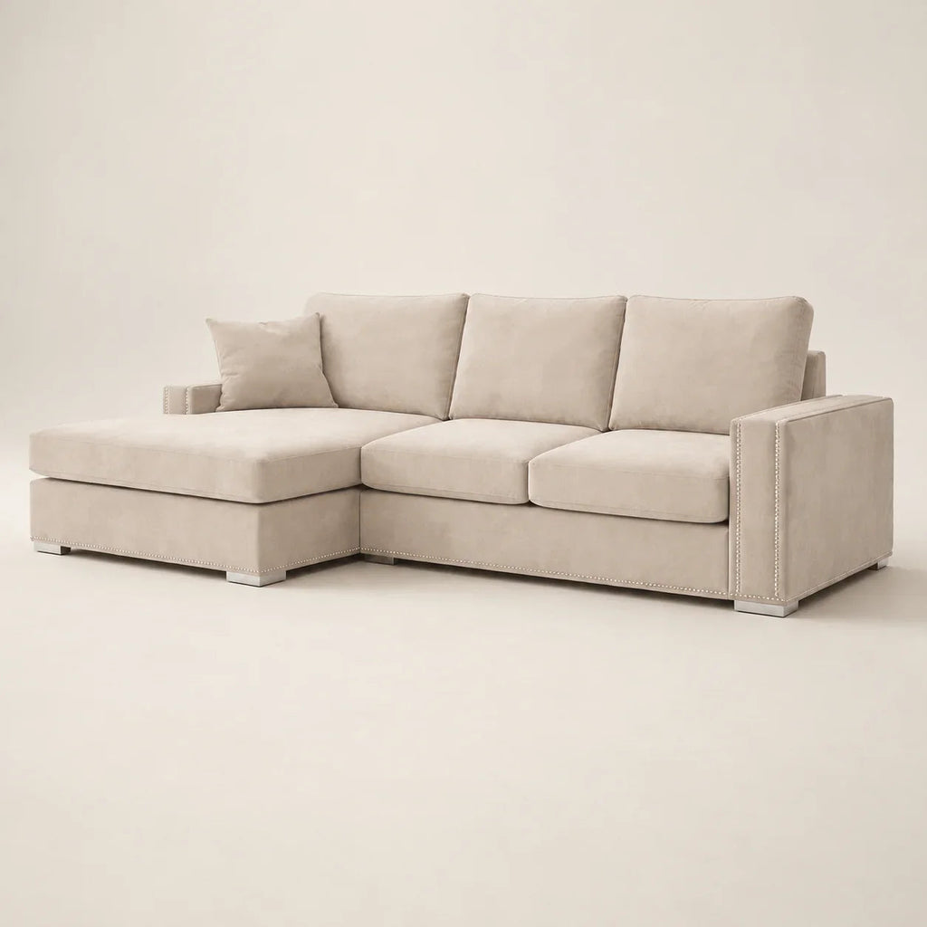 Beige sectional sofa with chaise lounge and nailhead trim, luxury living room furniture