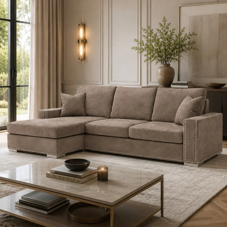 Luxury beige sectional sofa with nailhead trim in modern living room, perfect for UK homes