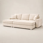 Luxury beige sectional sofa with chaise, nailhead trim, and plush cushions for modern living rooms