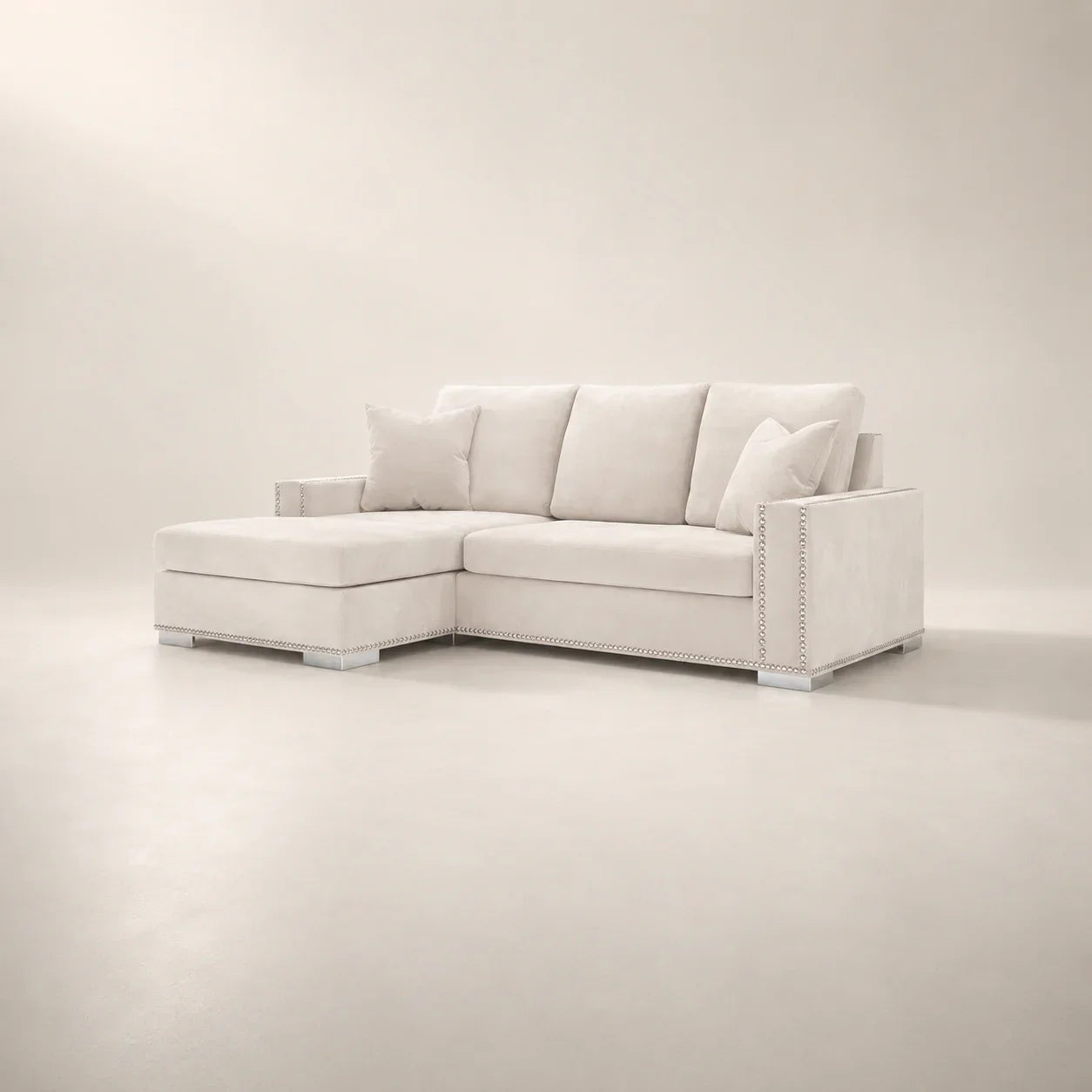 Luxury white sectional sofa with chaise and nailhead trim, modern living room furniture