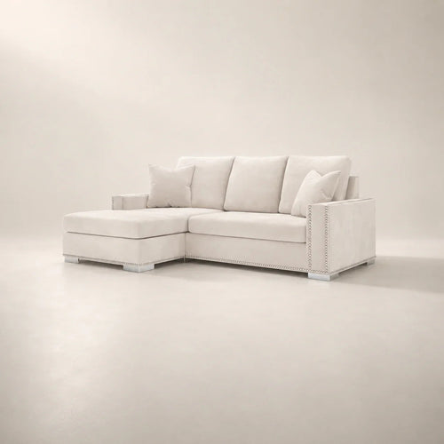 Luxury white sectional sofa with chaise and nailhead trim, modern living room furniture