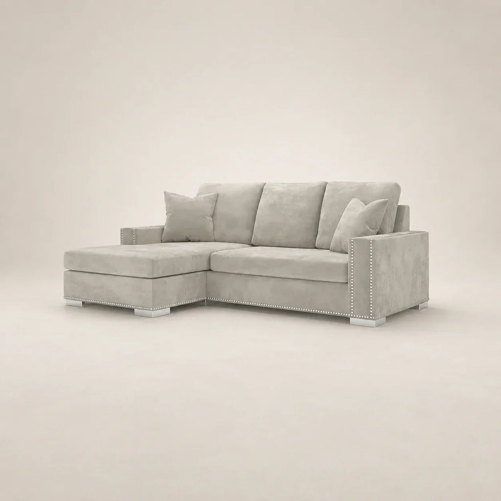 Luxury gray velvet sectional sofa with chaise and nailhead trim, perfect for modern living rooms