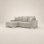 Luxury gray velvet sectional sofa with chaise and nailhead trim, perfect for modern living rooms