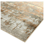 Modern abstract area rug with gray, beige, and rust tones, soft texture, and fringed edge for living room decor