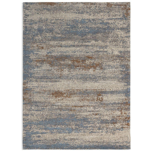 Abstract blue and beige area rug with distressed texture for modern living room decor