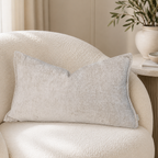 Luxury beige textured cushion on plush sofa with olive branch decor, perfect for modern living rooms