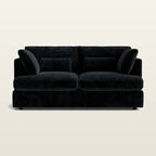Luxury black velvet two-seater sofa with plush cushions, modern design for living room comfort