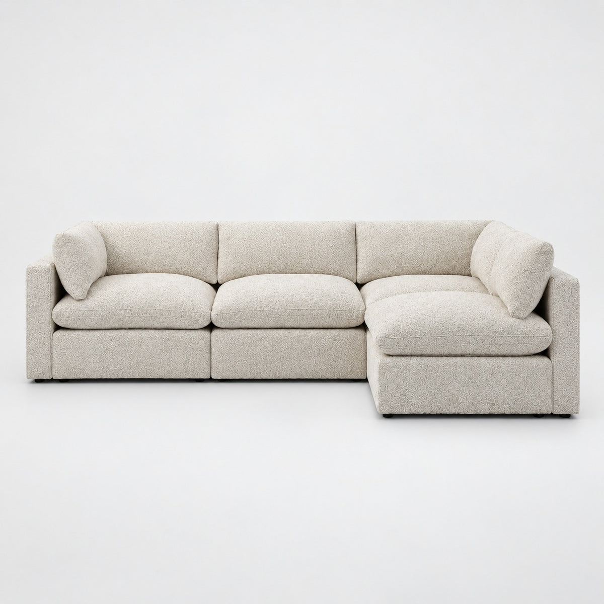 Bellano L-Shape Sofa — Boucle / Meringue / Pillow — Extra-soft fibre & feather — plain background