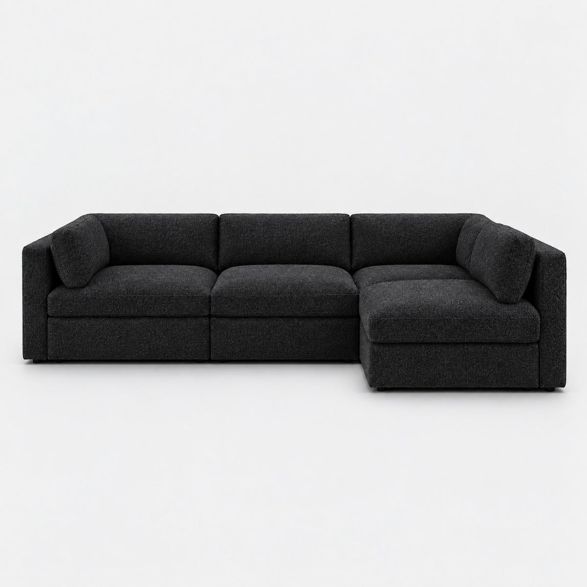 Bellano L-Shape Sofa — Boucle / Midnight / Box — Supportive memory foam — plain background