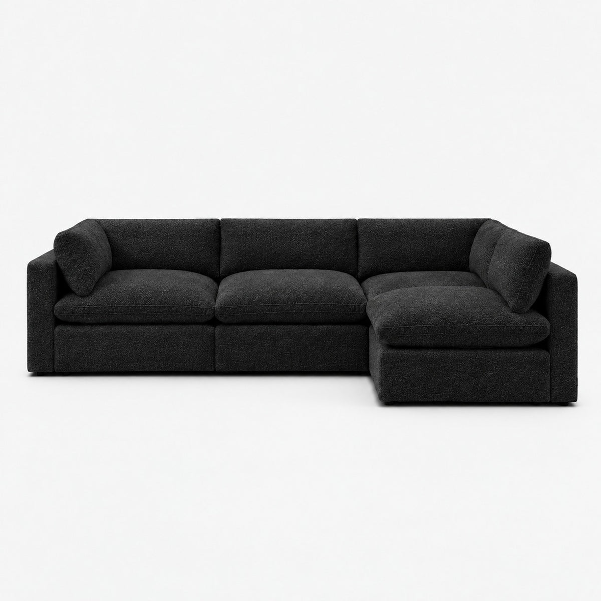 Bellano L-Shape Sofa — Boucle / Midnight / Pillow — Extra-soft fibre & feather — plain background