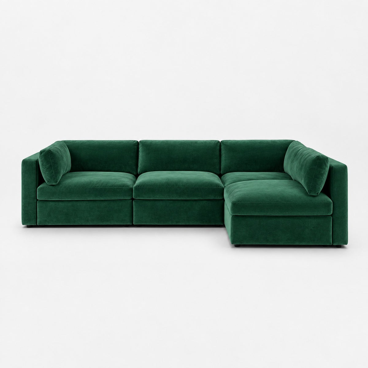 Bellano L-Shape Sofa — Plush Velvet / Emerald / Box — Supportive memory foam — plain background