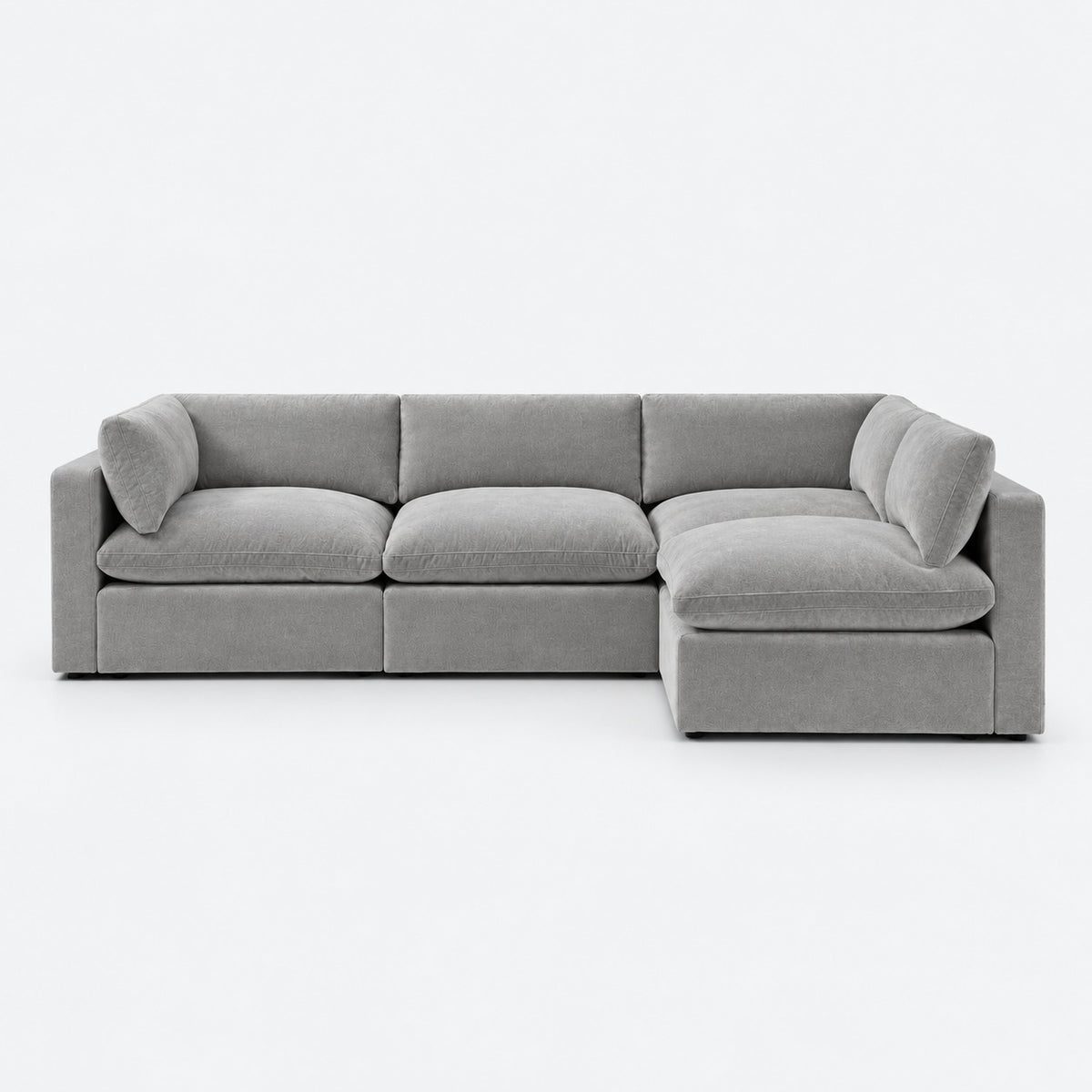 Bellano L-Shape Sofa — Plush Velvet / Silver / Pillow — Extra-soft fibre & feather — plain background