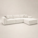 Luxury white sectional sofa with chaise and plush cushions, modern minimalist design