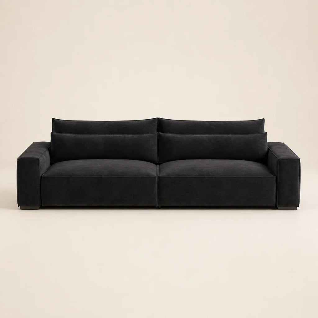 Black modern luxury sofa with plush cushions, ideal for contemporary living rooms