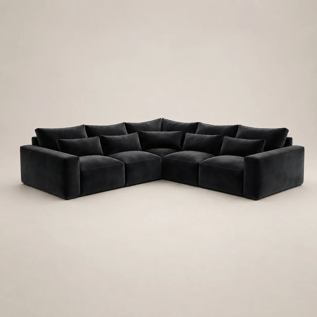 Black velvet L-shaped sectional sofa with plush cushions, modern luxury living room furniture