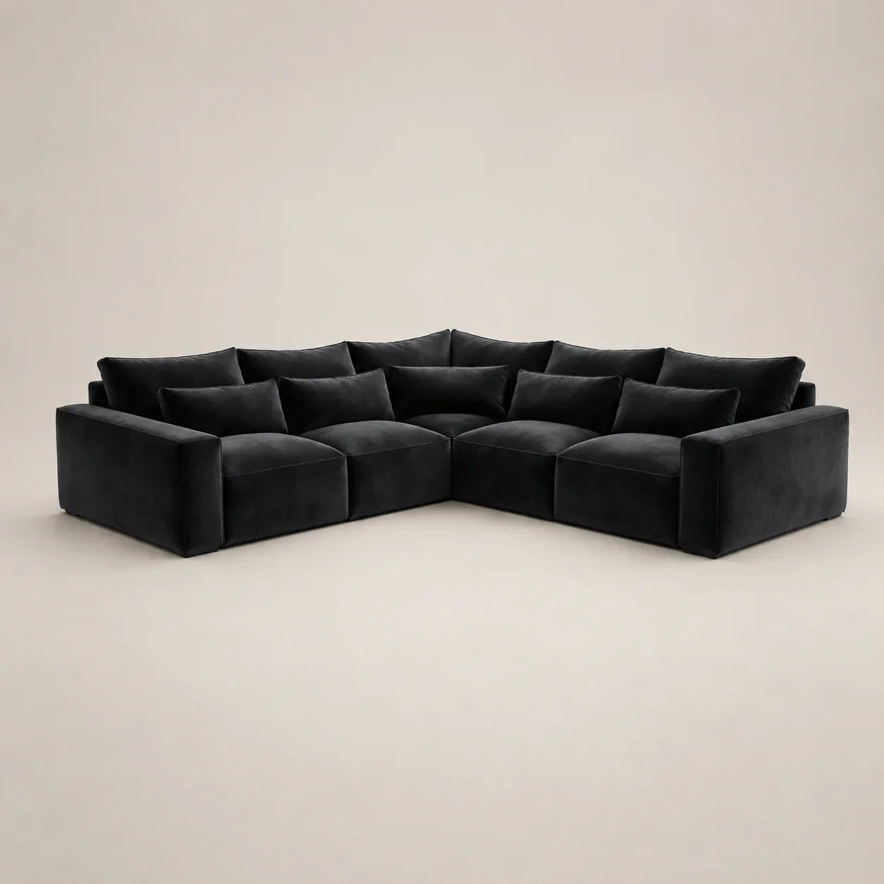 Black velvet L-shaped sectional sofa with plush cushions, modern luxury living room furniture