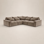 Luxury L-shaped sectional sofa in soft grey velvet, perfect for modern living rooms
