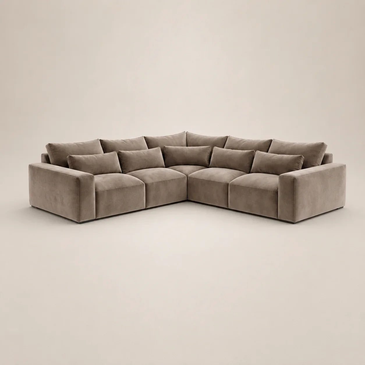 Luxury L-shaped sectional sofa in soft grey velvet, perfect for modern living rooms