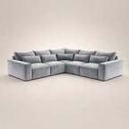 Luxury gray velvet corner sofa with plush cushions, modern sectional design for living room comfort