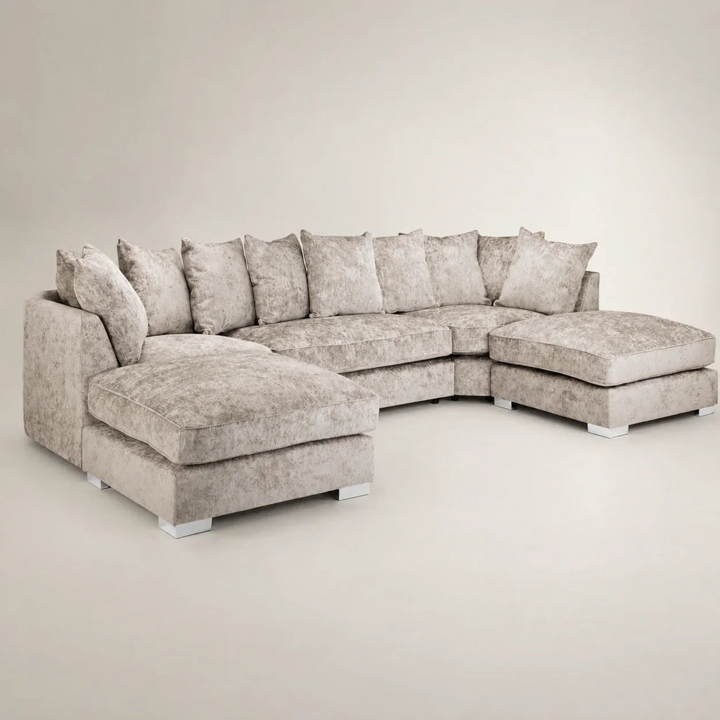 Luxury grey sectional sofa with chaise lounges and plush cushions, ideal for modern living rooms