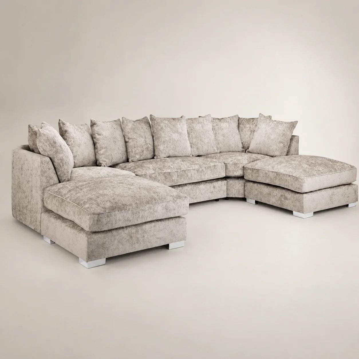 Luxury grey sectional sofa with chaise lounges and plush cushions, ideal for modern living rooms