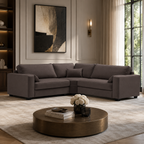 Luxury grey sectional sofa in modern living room with round coffee table and abstract art