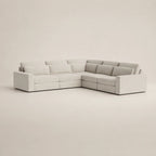 Modern L-shaped sectional sofa in light gray fabric, perfect for luxury living rooms