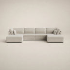 Modern light grey sectional sofa with chaise lounges, ideal for luxury living room furniture
