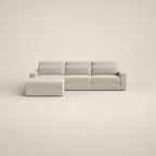 Modern light grey sectional sofa with chaise lounge, minimalist design for luxury living rooms