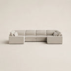 Modern beige sectional sofa with chaise lounges, ideal for luxury living room furniture