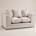 Luxury beige two-seater sofa with plush cushions, ideal for modern living rooms