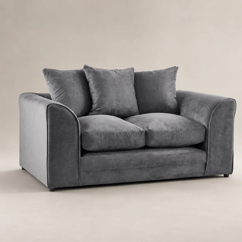 Grey velvet two-seater sofa with plush cushions, luxury living room furniture