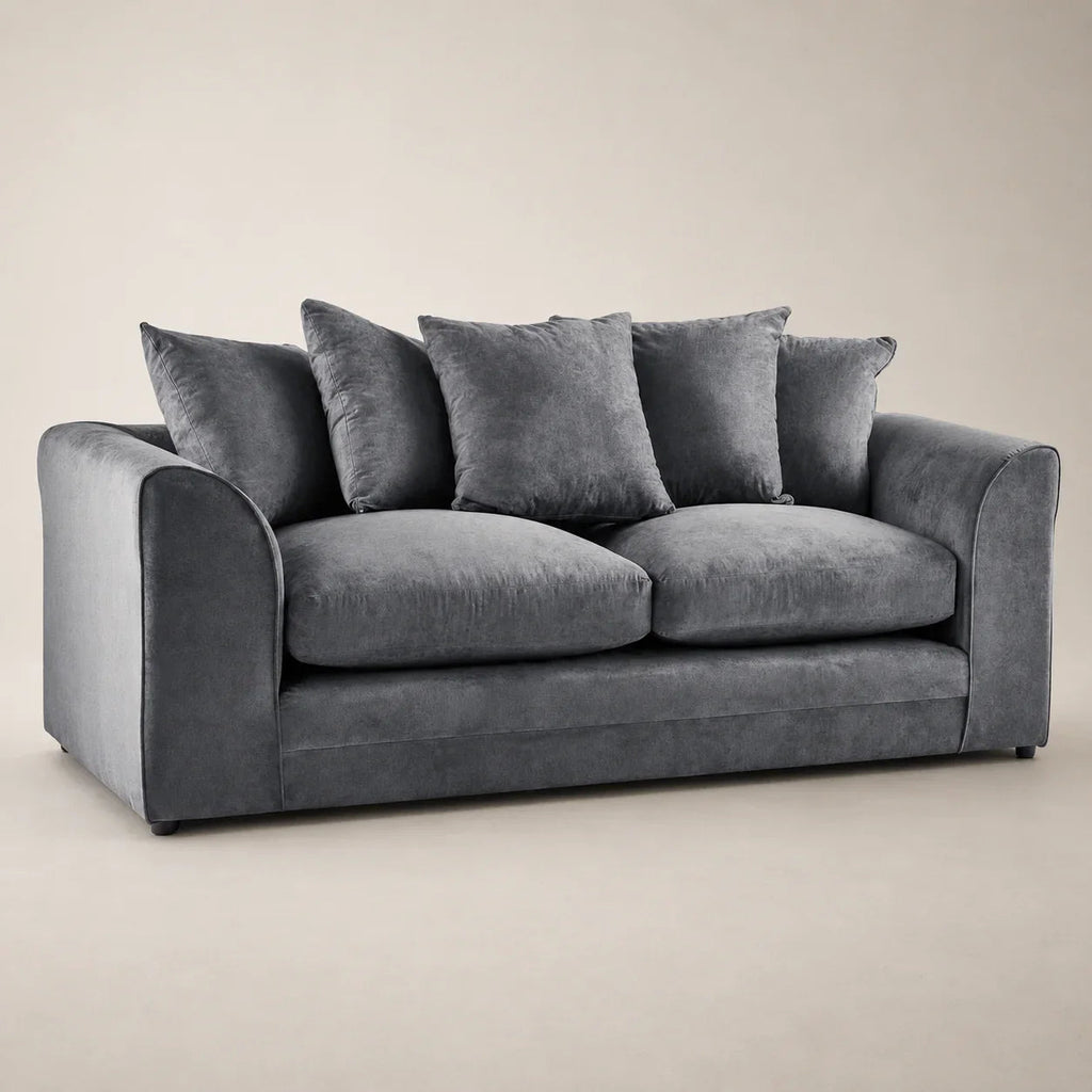 Luxury grey velvet sofa with plush cushions, ideal for modern living rooms