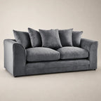 Luxury grey velvet sofa with plush cushions, ideal for modern living rooms