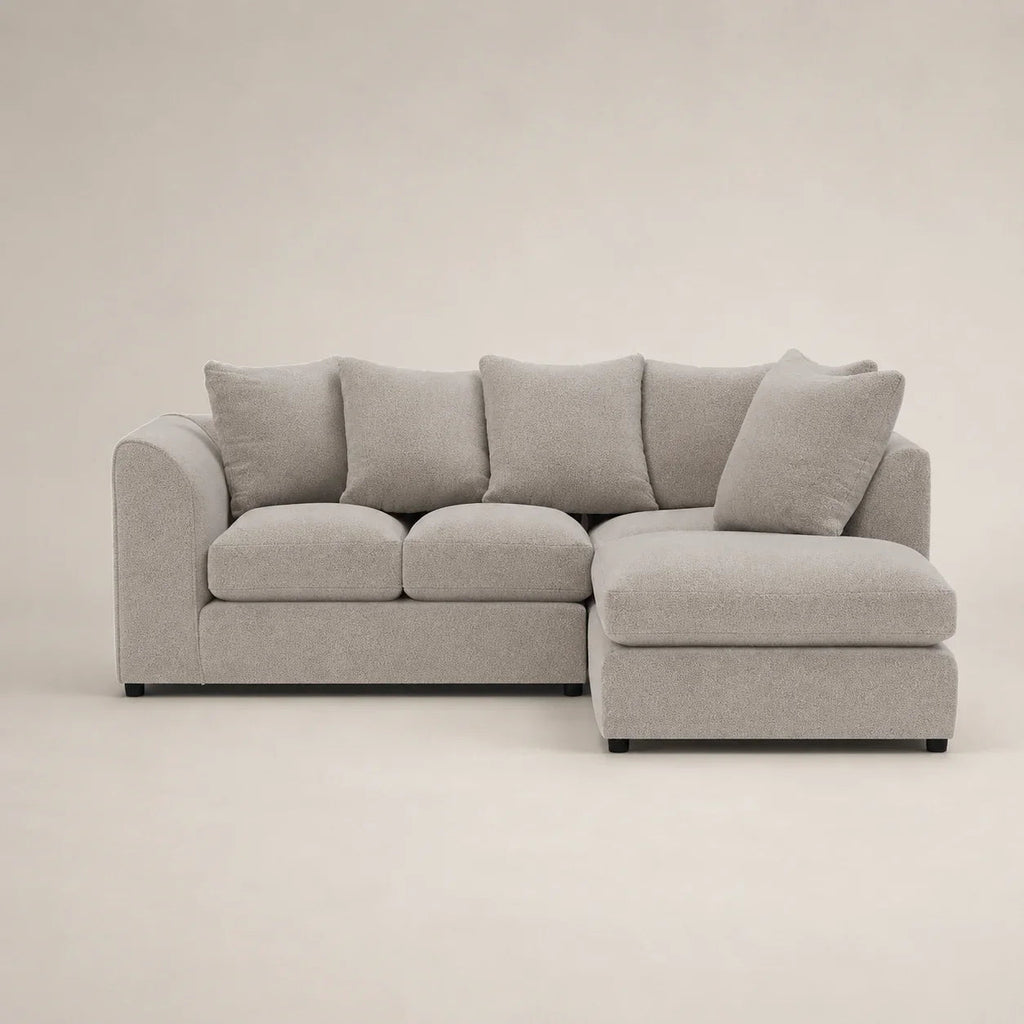 Luxury grey sectional sofa with chaise lounge, plush cushions, modern design for living room comfort