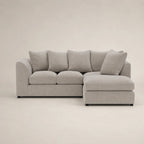 Luxury grey sectional sofa with chaise lounge, plush cushions, modern design for living room comfort