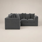 Dark gray sectional sofa with plush cushions, modern design for luxury living spaces