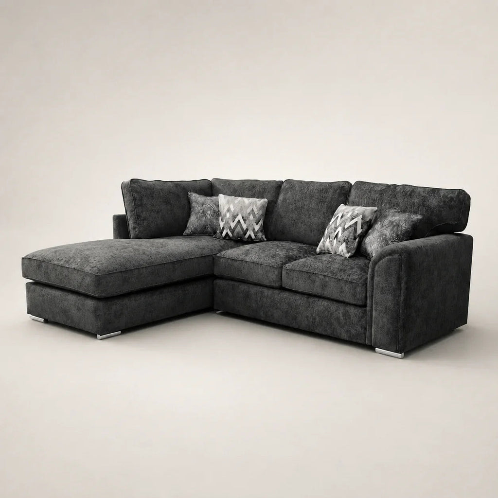 Luxury dark gray sectional sofa with chaise and patterned pillows, modern living room furniture