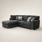 Luxury dark gray sectional sofa with chaise and patterned pillows, modern living room furniture