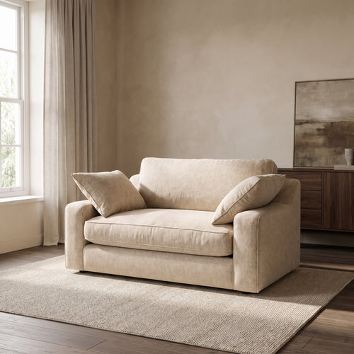 Alderley Snuggler Love Seat — main lifestyle view in a warm stone and walnut living room