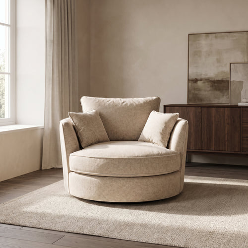 Alderley Swivel Cuddle Chair — main lifestyle view in a warm stone and walnut living room