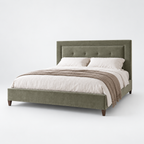 CK Living Amoret upholstered bed in muted sage velvet — plain cold-white grey background