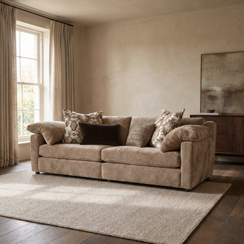 Ashbourne 4 Seater Split Sofa — main lifestyle view in a warm stone and walnut living room