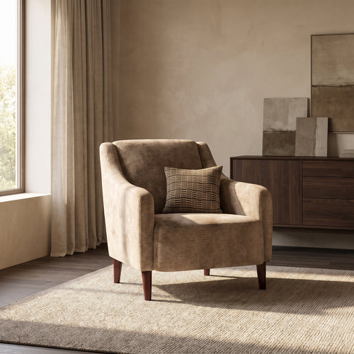 Ashbourne Accent Chair — main lifestyle view in a warm stone and walnut living room