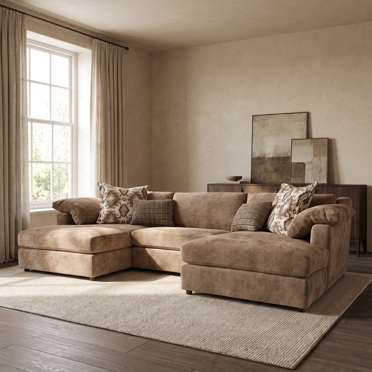 Ashbourne Grande Double Chaise Sofa — main lifestyle view in a warm stone and walnut living room